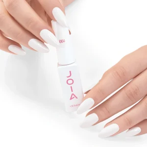 JOIA Vegan Gel Polish 004 Clean Bright White 6ml — hand holding bottle with painted nails