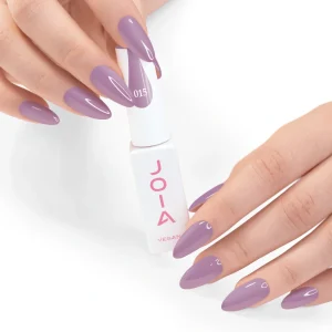 JOIA Vegan Gel Polish 015 Muted Orchid Mauve 6ml — hand holding bottle with painted nails