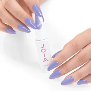 JOIA Vegan Gel Polish 017 Periwinkle Blue 6ml — hand holding bottle with painted nails