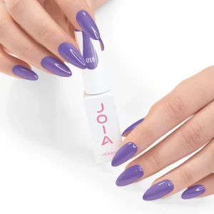 JOIA Vegan Gel Polish 018 Deep Violet 6ml — hand holding bottle with painted nails
