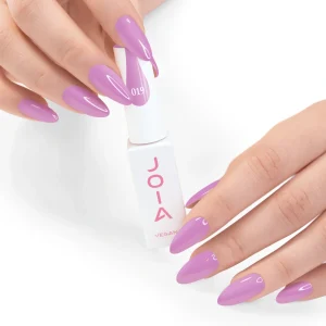 JOIA Vegan Gel Polish 019 Soft Orchid Pink 6ml — hand holding bottle with painted nails