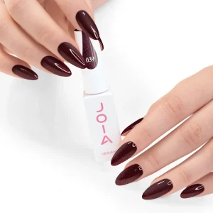 JOIA Vegan Gel Polish 039 Black Cherry Shimmer 6ml — hand holding bottle with painted nails