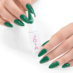 JOIA Vegan Gel Polish 050 Emerald Green 6ml — hand holding bottle with painted nails