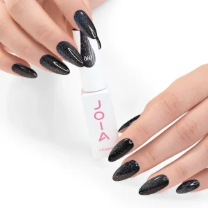 JOIA Vegan Gel Polish 060 Black Glitter 6ml — hand holding bottle with painted nails