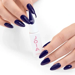 JOIA Vegan Gel Polish 061 Midnight Indigo 6ml — hand holding bottle with painted nails