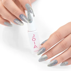 JOIA Vegan Gel Polish 069 Silver Holographic Glitter 6ml — hand holding bottle with painted nails