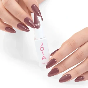 JOIA Vegan Gel Polish 078 Dusty Rosewood 6ml — hand holding bottle with painted nails