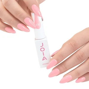 JOIA Vegan Gel Polish 170 Pastel Pink 6ml — hand holding bottle with painted nails